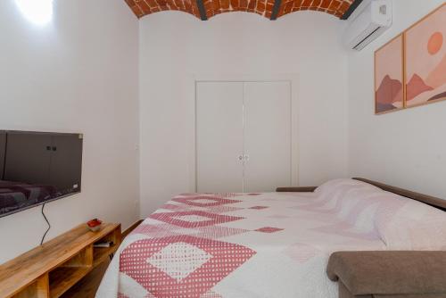 Кровать или кровати в номере Royal Apartment