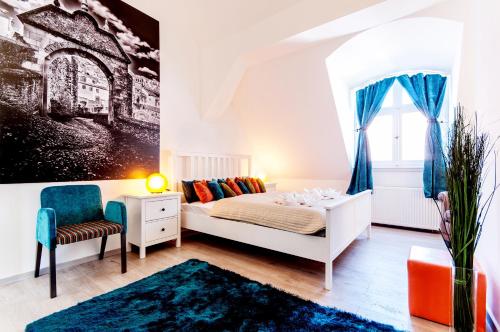 Letto o letti in una camera di Central Apartments