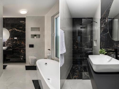 uma casa de banho com um lavatório, uma banheira e um WC. em Luxury Wellness & Spa Villa Depaja em Zadar