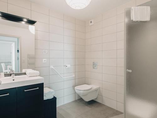 Koupelna v ubytování Appart' du Trident