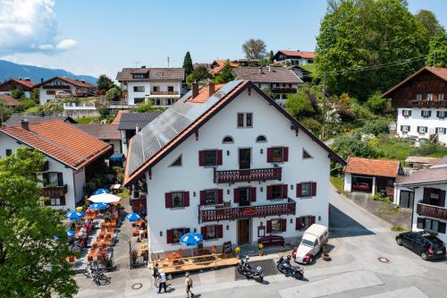 an aerial view of a building in a town at Gasthof zur Post Saulgrub in Saulgrub
