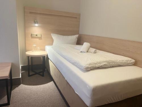 Una cama o camas en una habitación de Altes Sudhaus