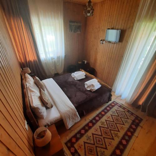 Cama o camas de una habitación en Bana