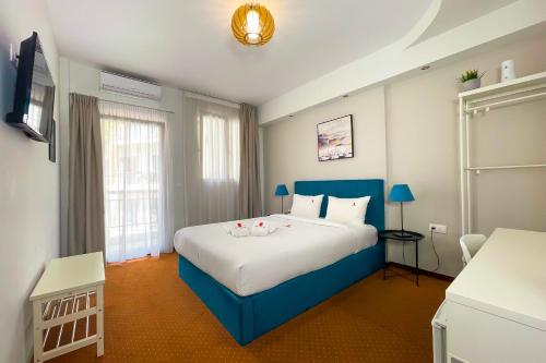 Postel nebo postele na pokoji v ubytování City Plaza Apartments & Rooms