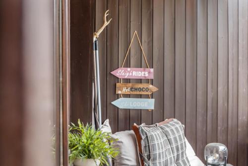 a group of signs hanging on a wall at Haus Excelsior Top 31 in Seefeld in Tirol