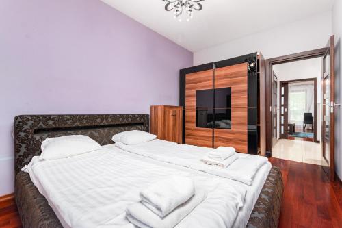 Posteľ alebo postele v izbe v ubytovaní Jana Kazimierza 30 by Homeprime