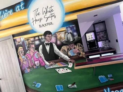 a mural of a poker table in a casino at The White House Vegas Suites in Blackpool