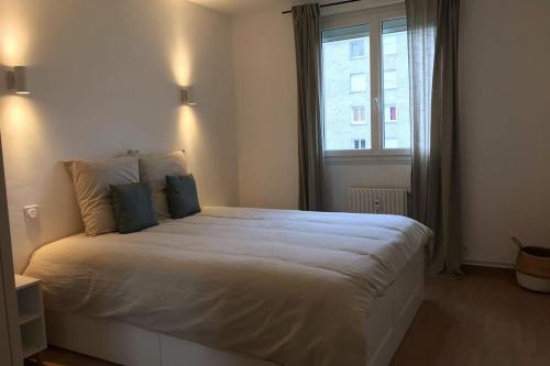 Llit o llits en una habitació de Appartement à 2 pas du Mont St-Michel