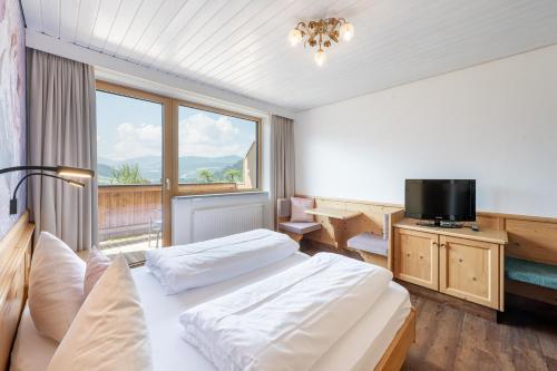 Posteľ alebo postele v izbe v ubytovaní Landhaus Ager