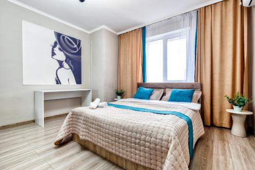 Postel nebo postele na pokoji v ubytování ЖК Арман Кала