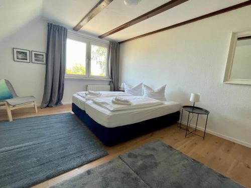 Postel nebo postele na pokoji v ubytování Hostel DünenMeer