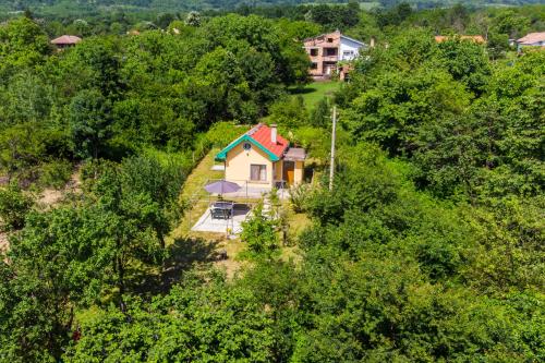 an overhead view of a house in the trees at Holiday Home Milkovci in Gabrovo