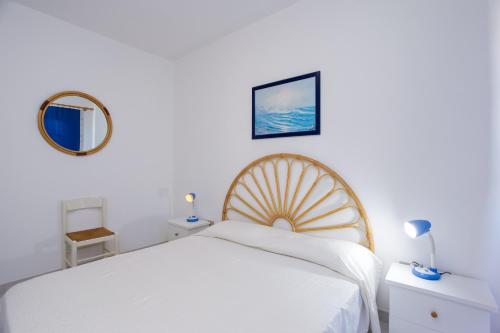 Ένα ή περισσότερα κρεβάτια σε δωμάτιο στο Bilo Mare Panoramico