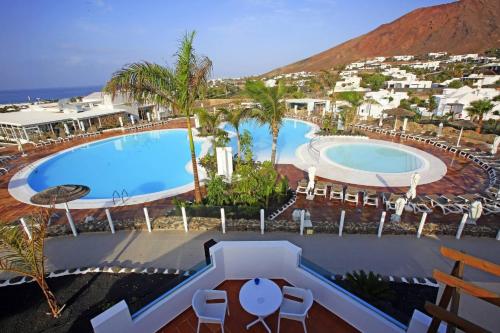 an overhead view of a pool at a resort at Labranda Alyssa Suite Hotel in Playa Blanca