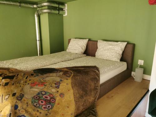 a bedroom with a bunk bed and a couch at Travel&Sleep Airport Apartment Zarembowicza in Wrocław