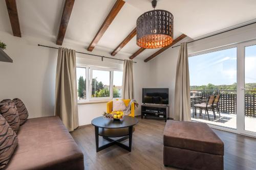 Posezení v ubytování Apartman Bijeca - Medulin