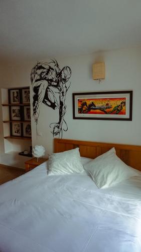 Katil atau katil-katil dalam bilik di Hôtel la Fête en Provence