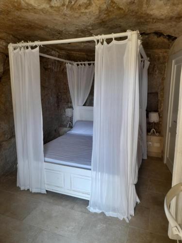 Ένα ή περισσότερα κρεβάτια σε δωμάτιο στο Borgo Hedone
