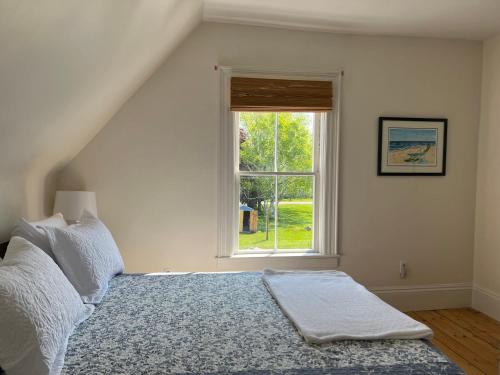a bedroom with a bed and a window at OH Victoria Hotel - Red Beard Suite 2B 2BTH in Hampton 