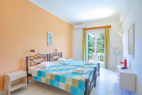 Postel nebo postele na pokoji v ubytování Fran Apartments