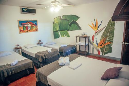 Ένα ή περισσότερα κρεβάτια σε δωμάτιο στο Casita de Playa BOMALU