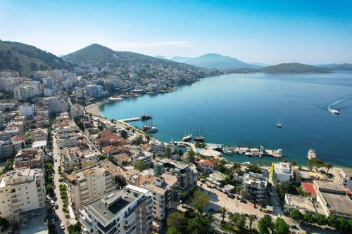an aerial view of a city next to a body of water at Villa All Season in Sarandë