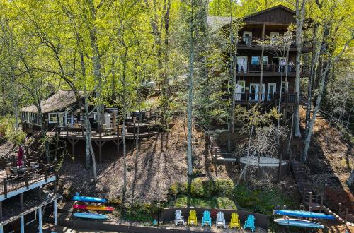 an aerial view of a resort in the woods at White Oak Point on Lake Lure in Lake Lure