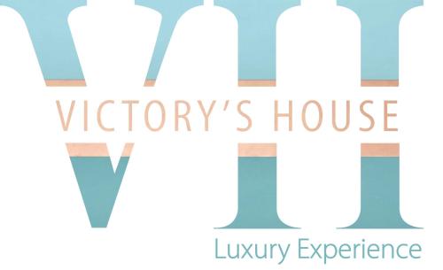 a group of wine bottles with the text victorys house luxury experience at Victory's Luxury House with Jacuzzi on the Roof in Ischia