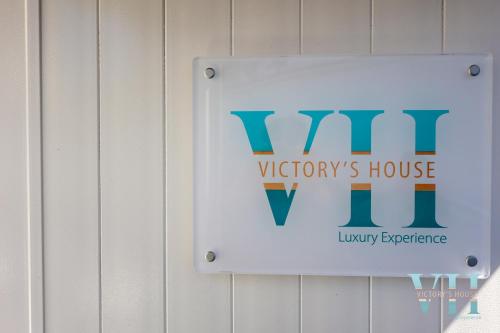a sign on a building that says mtvictorys house at Victory's Luxury House with Jacuzzi on the Roof in Ischia
