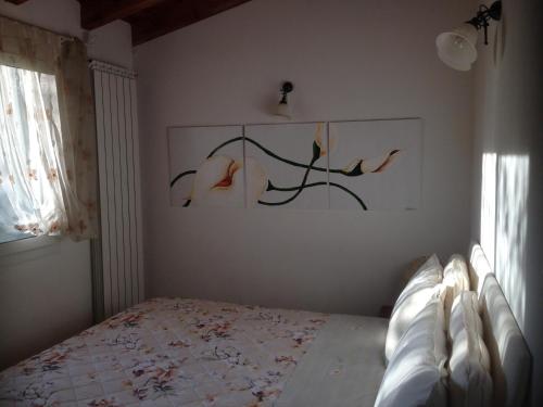 Il Rifugio Di Artemide AGRITURISMOにあるベッド