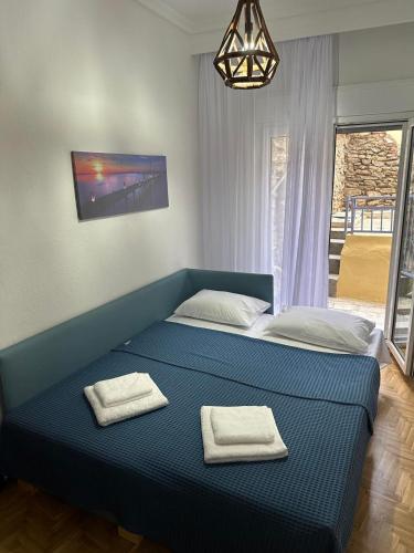 Ένα ή περισσότερα κρεβάτια σε δωμάτιο στο Agnanti Apartment