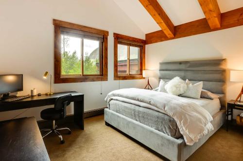 A bed or beds in a room at Elegant Vail Home - Walk to Booth Falls Trail
