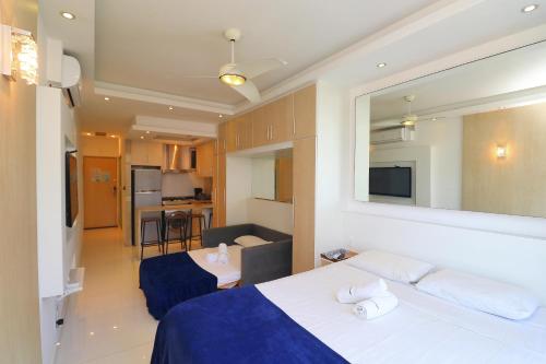 Кровать или кровати в номере Rio Spot Homes Flat C033A