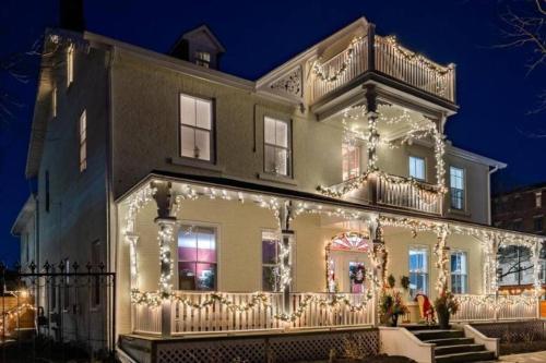 a large house with christmas lights on it at Lakehurst Estate in Cobourg