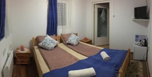 Cama o camas de una habitación en Hegyi-lak vendégház
