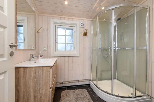 a bathroom with a shower and a sink at Holiday home in beautiful Sjusjøen, near Lillehammer in Ringsaker