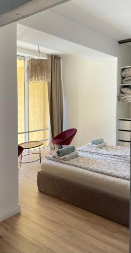 Postel nebo postele na pokoji v ubytování Good Space Palanga