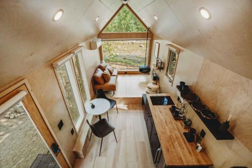 an overhead view of a tiny house with a window at Lumen Nature Retreat in Woodstock