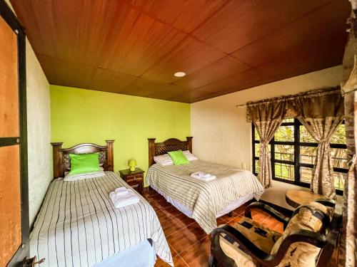 Posteľ alebo postele v izbe v ubytovaní Rancho Fortaleza -Hotel & Spa-
