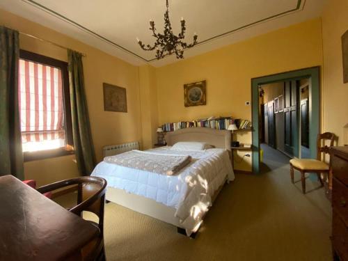 En eller flere senger på et rom på Lodge Villa Maria