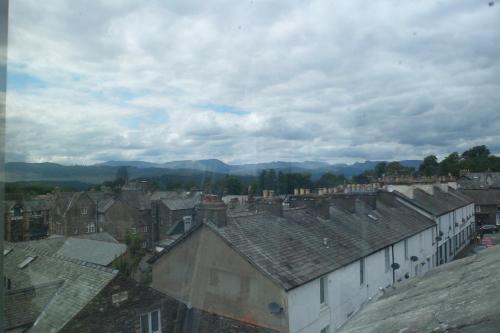 a view of a town with roofs of buildings at The Swainson Suite in Windermere