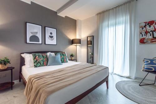 En eller flere senge i et værelse på Marble - a pochi passi dal centro e dalla stazione