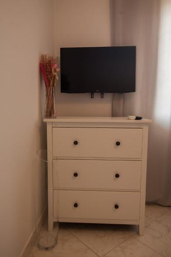 Apartment Dinoにあるテレビまたはエンターテインメントセンター