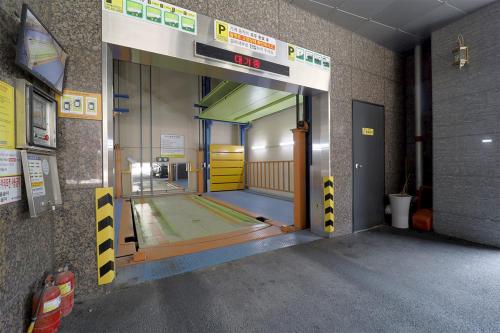 an entrance to a swimming pool in a building at HOTEL YUNA Business in Busan