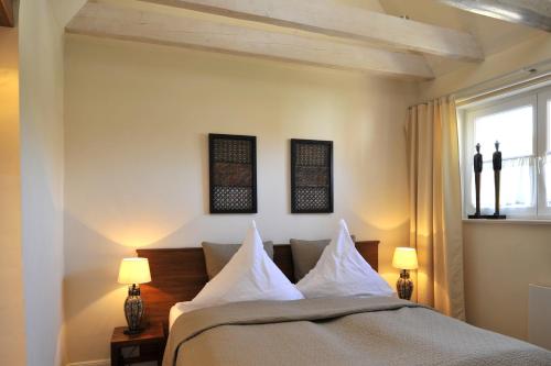 Postel nebo postele na pokoji v ubytování Bines Hues