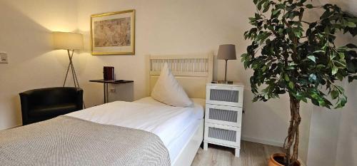 Hotelbetriebe Güldenhaupt GmbHにあるベッド