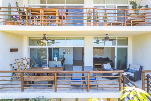 two images of a house with a deck at Casa Chaparra - Monterosa in Sayulita