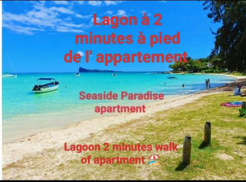 una playa con las palabras laguna un minuto un golpeteo en Seaside Paradise 2 minutes à pied du Lagoon, en Pereybere