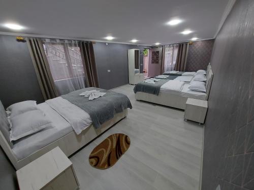 Postel nebo postele na pokoji v ubytování Hotel Rabat Castle