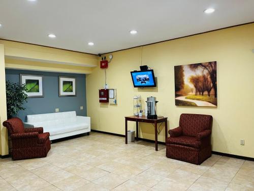 Χώρος καθιστικού στο Rodeway Inn